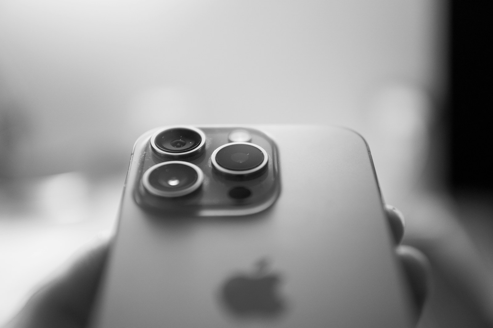 iPhone camera lenses are clearly visible up close.