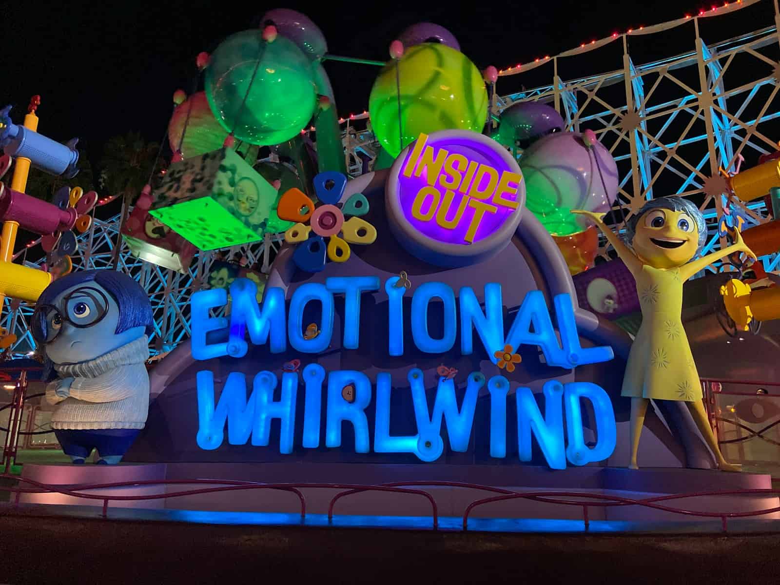a sign that says emotional whirlwind at night