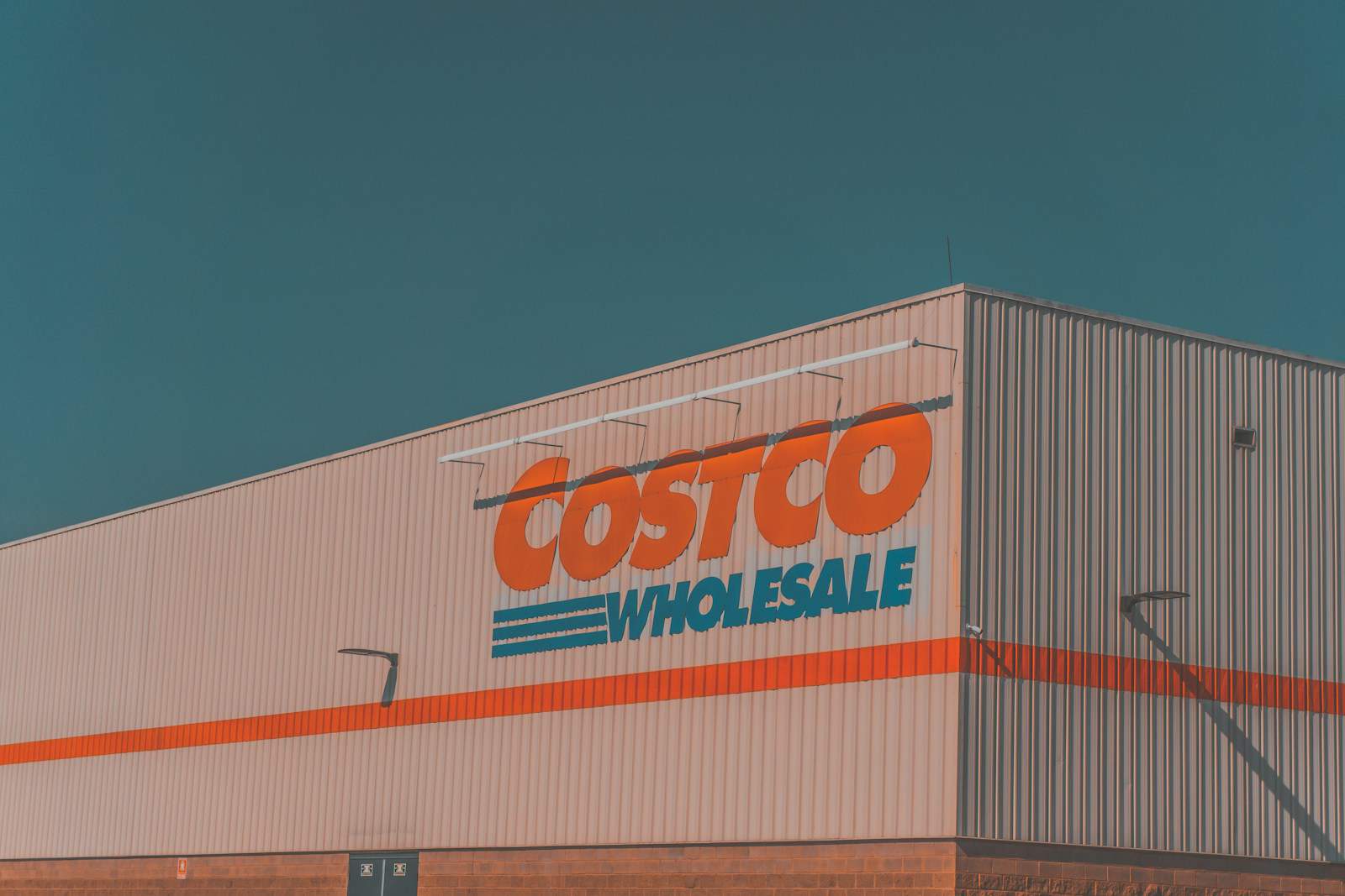 a building with a sign that says costco whole sale