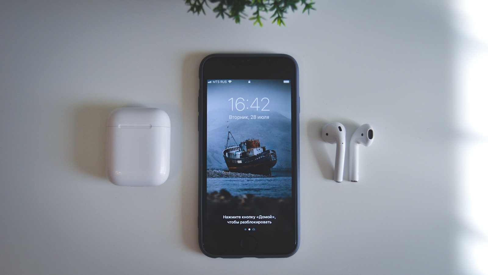 black samsung android smartphone on white table