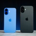 Two iphones sitting side by side on a table