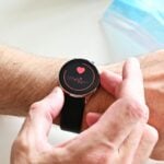 a person holding a stopwatch
