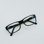 black-framed eyeglasses