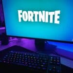 black flat screen computer monitor with black computer keyboard