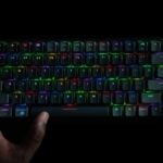 a person holding a keyboard