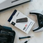 a video game controller and a game controller on a table