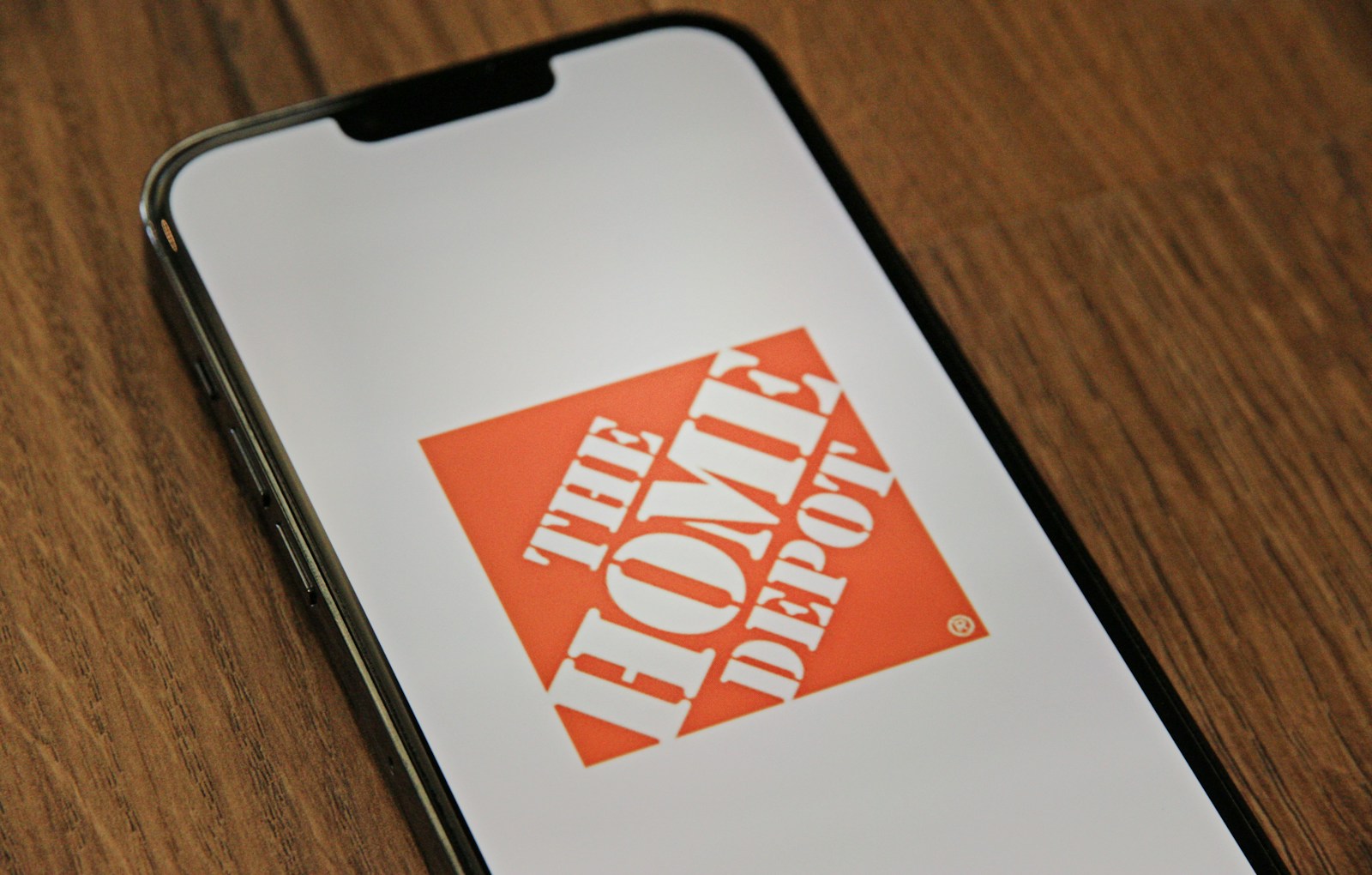 a phone with the home depot logo on it