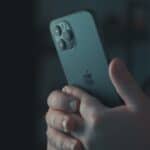 person holding silver iphone 6