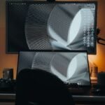 a person's legs and a tv screen