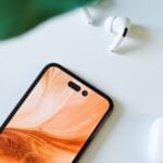 a cell phone sitting on top of a white table