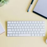 a keyboard and a mouse on a desk