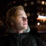 man wearing black hoodie