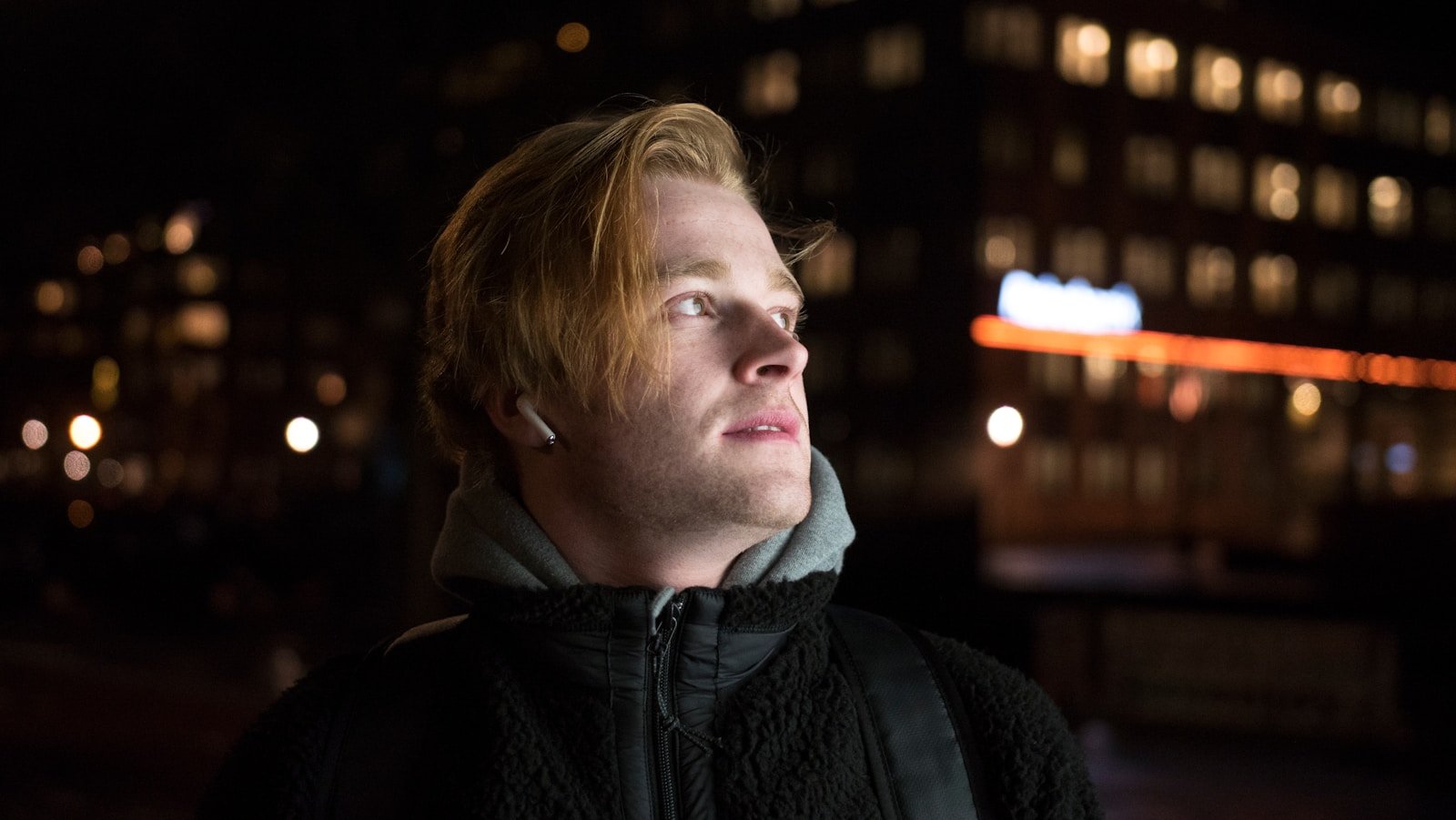 man wearing black hoodie