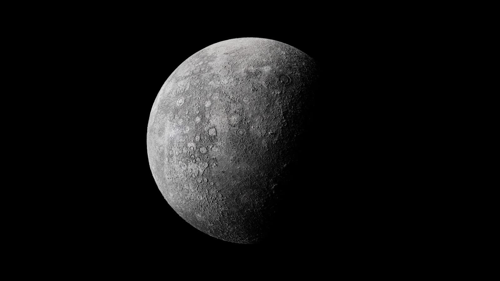 The moon in shadow in space.