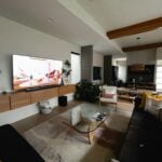 A living room filled with furniture and a flat screen TV