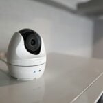 a white object with a black lens