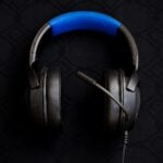 black and blue corded headphones